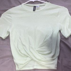 Mint green crop top with knot on the bottom